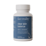 Supplement bottle labeled 'face reality clear skin balance'