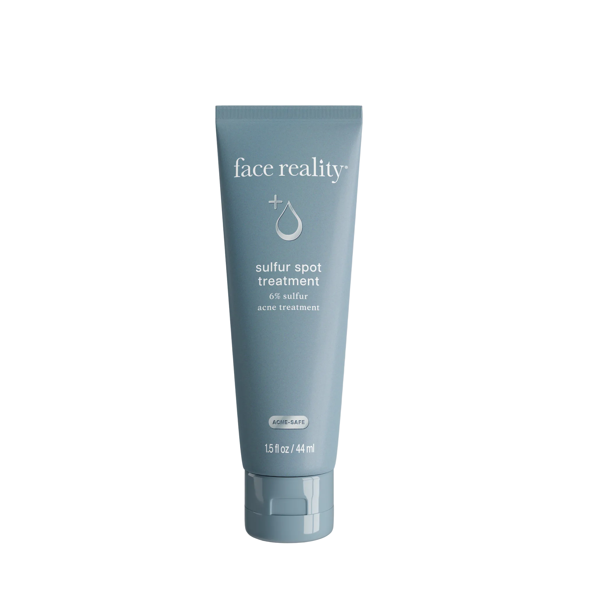 A tube of Face Reality Sulfur Spot Treatment on a blue bottle