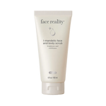 Tube of face reality I-mandelic face and body scrub on white packaging indicating brightens and exfoliates