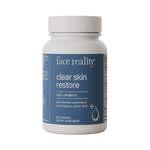 Supplement bottle labeled 'face reality clear skin restore'